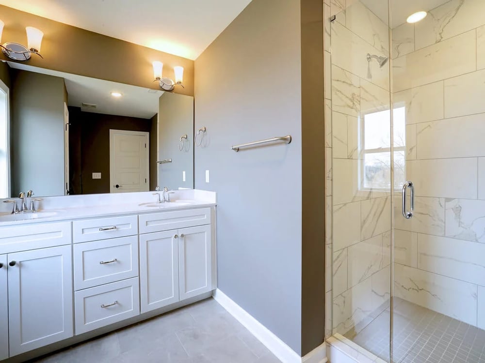 walk in shower with marble tile by chris gorman homes in cincinnati